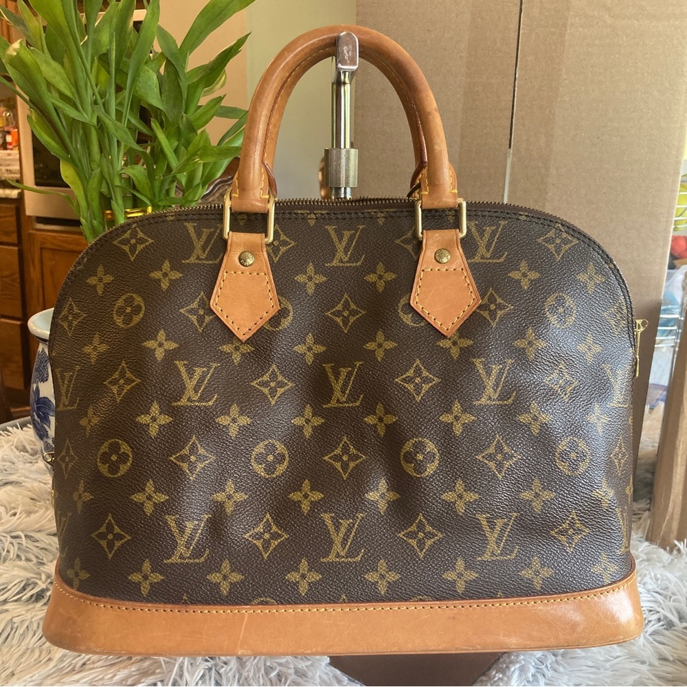 Louis vuitton Alma pm monogram brown preowned condition